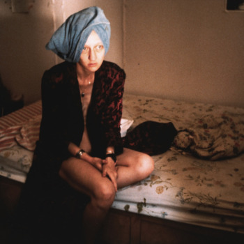 Nan Goldin, Suzanne on her bed, The Bowery NY, 1983