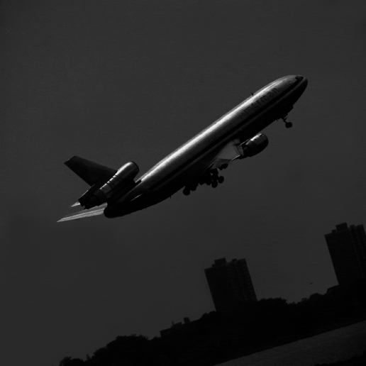 “McDonnell Douglas DC-10 on takeoff from J.F.K. International Airport, June 24, 1989”
All images are analog and are printed on silver bromide archival black and white photographic paper
75 x 75 cm / Edition of 10 
50 x 60 cm / Edition of 20